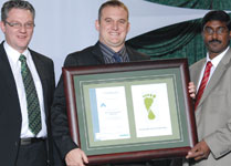 Advansys director Braam Venter (middle) accepts the award